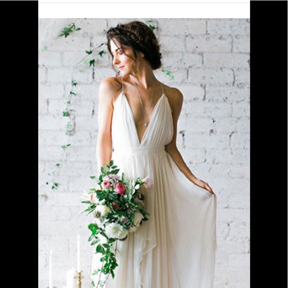 This dress is gorgeous but does not fit my body type, but is brand new.
